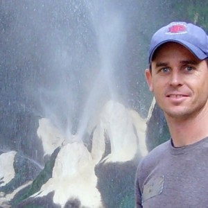Portrait of Jamie Brown with hot springs in the background