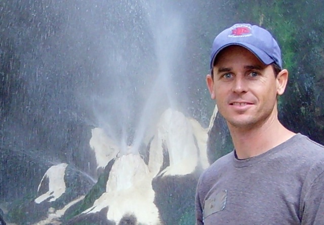 Portrait of Jamie Brown with hot springs in the background