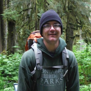 Portrait of Chris Ebert, visiting researcher in a forest